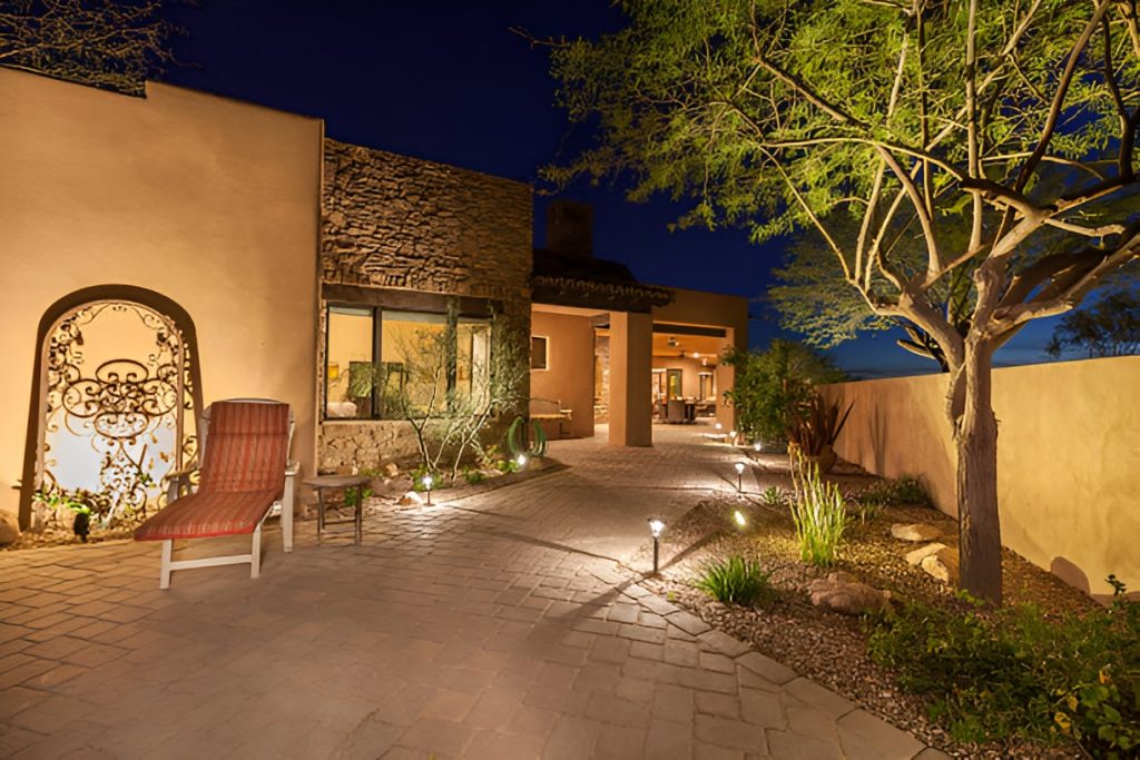 outdoor space with landscape lighting